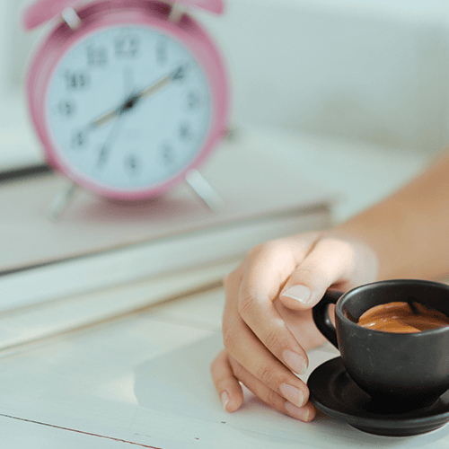 Clock and coffee representing flexible working time